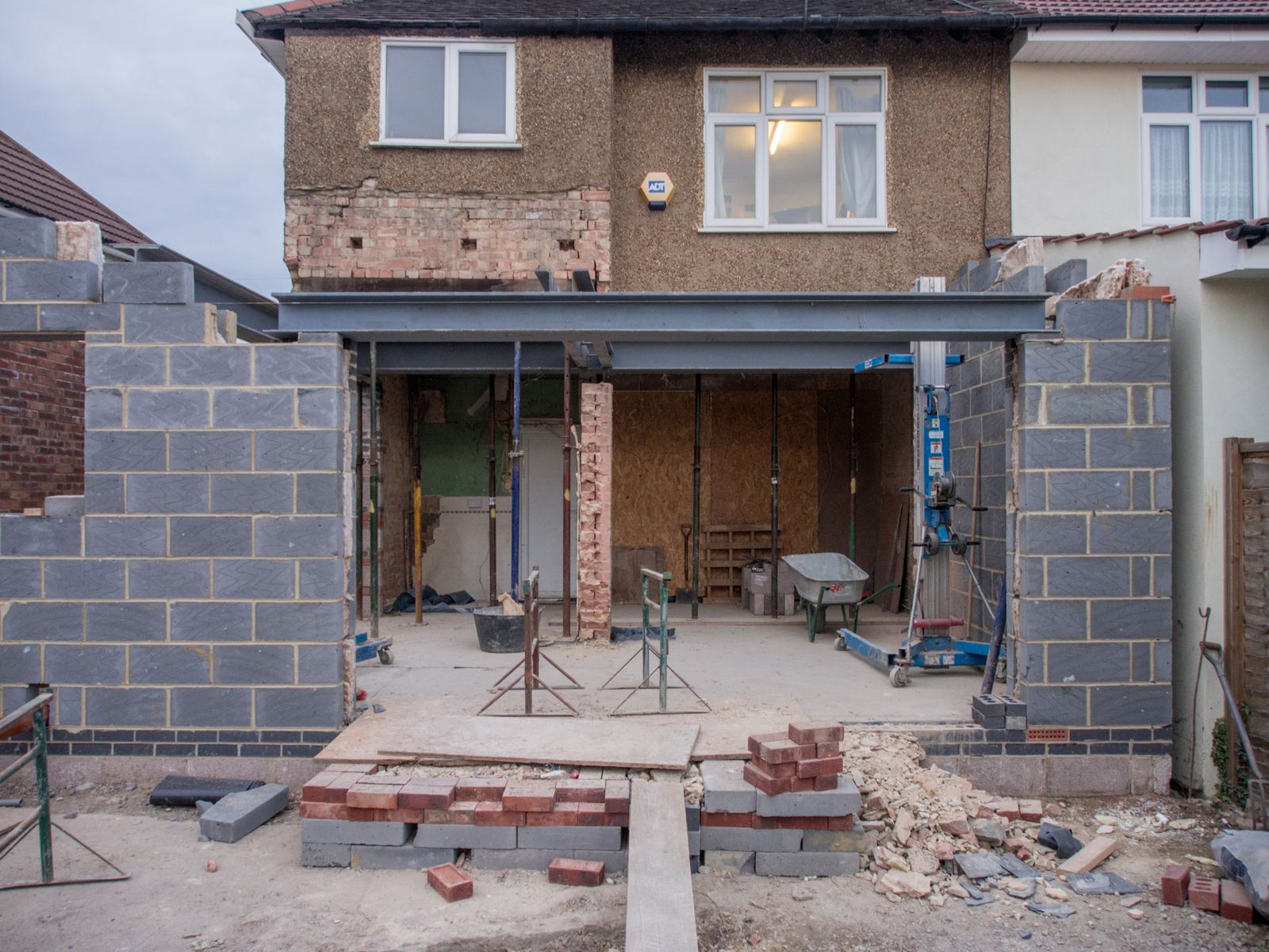 Illustrative house extension with block walls and structural steel